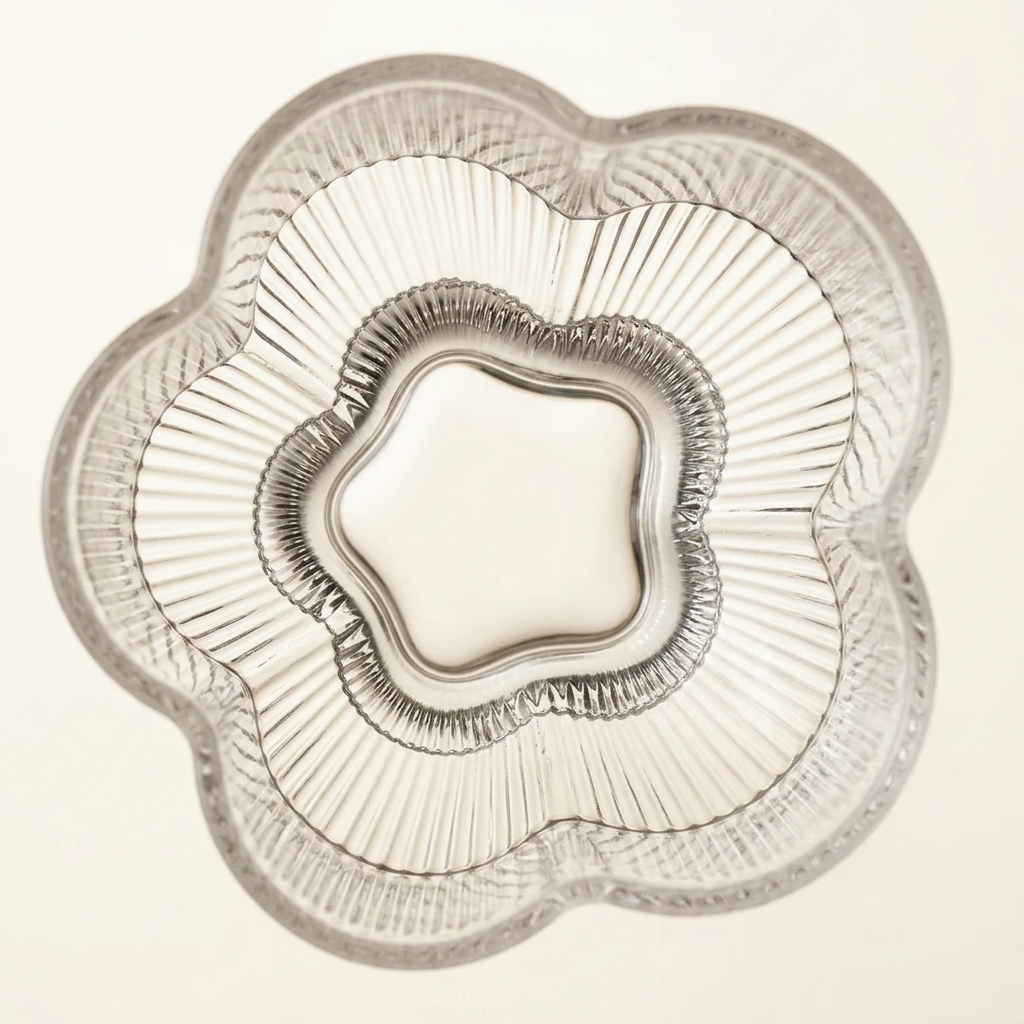 Clara glass detail on a warm neutral background