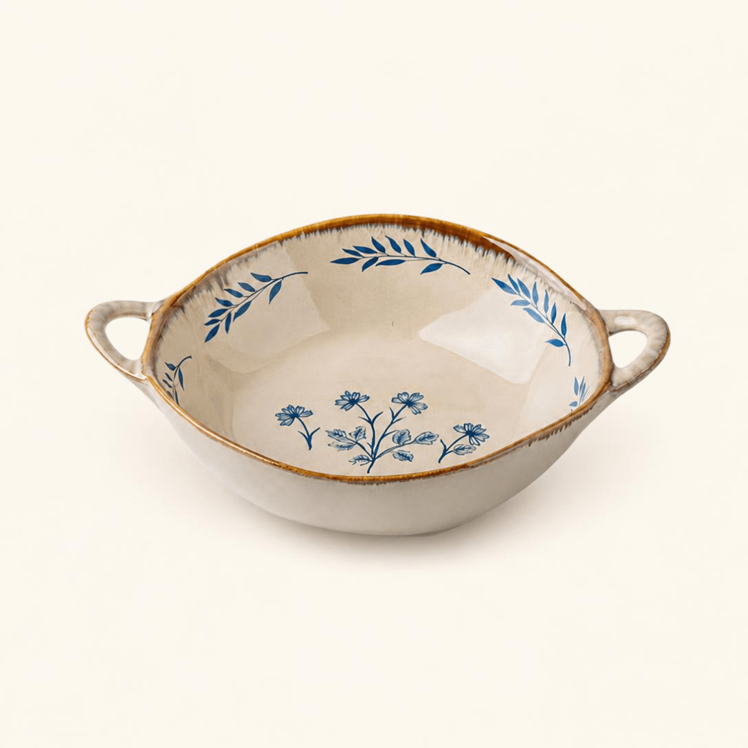 Elodie vintage ceramic bowl in blue botanical pattern with amber drip rim