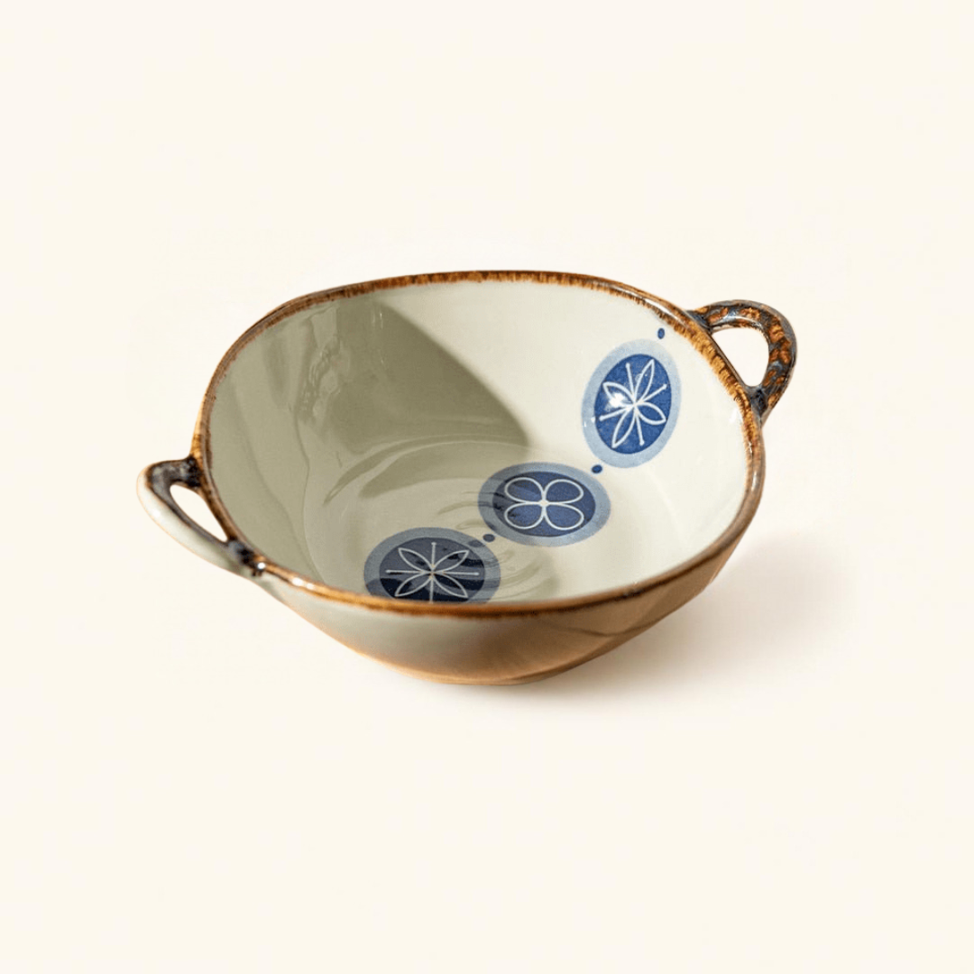 Hikaru ceramic bowl in Clover, floral pattern with brown rim