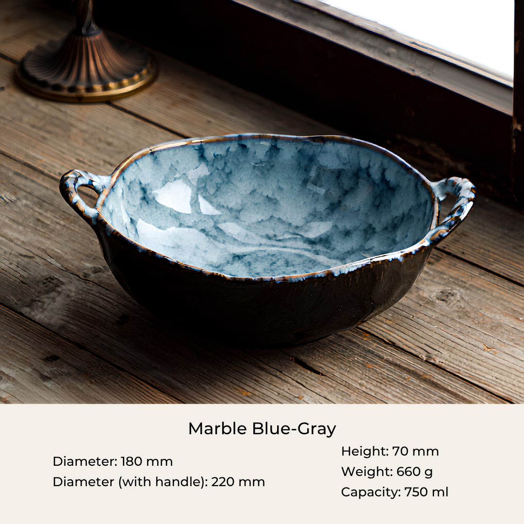 A ceramic bowl with a marbled blue-gray and dark gray glaze, featuring two side handles, displayed on a rustic wooden surface with product specifications printed below.