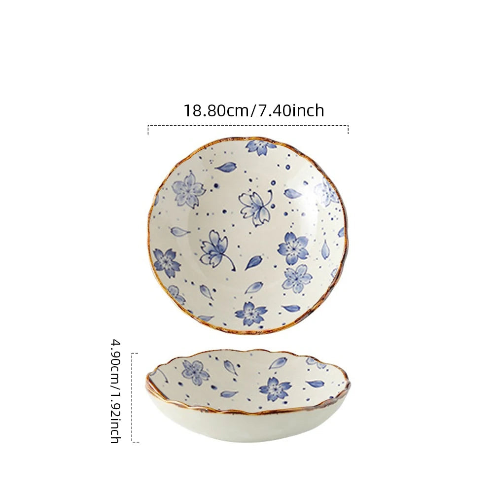 Ceramic bowl with floral design and measurements on a white background