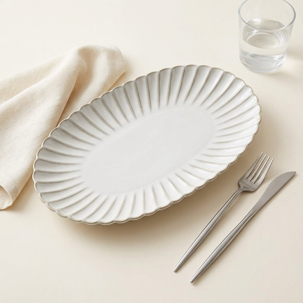 Aiko oval plate in a minimal table setting